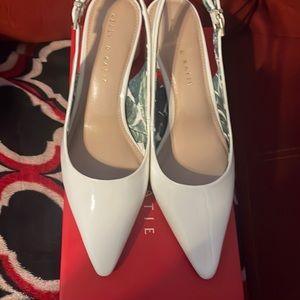 Brand new white pair of shoes